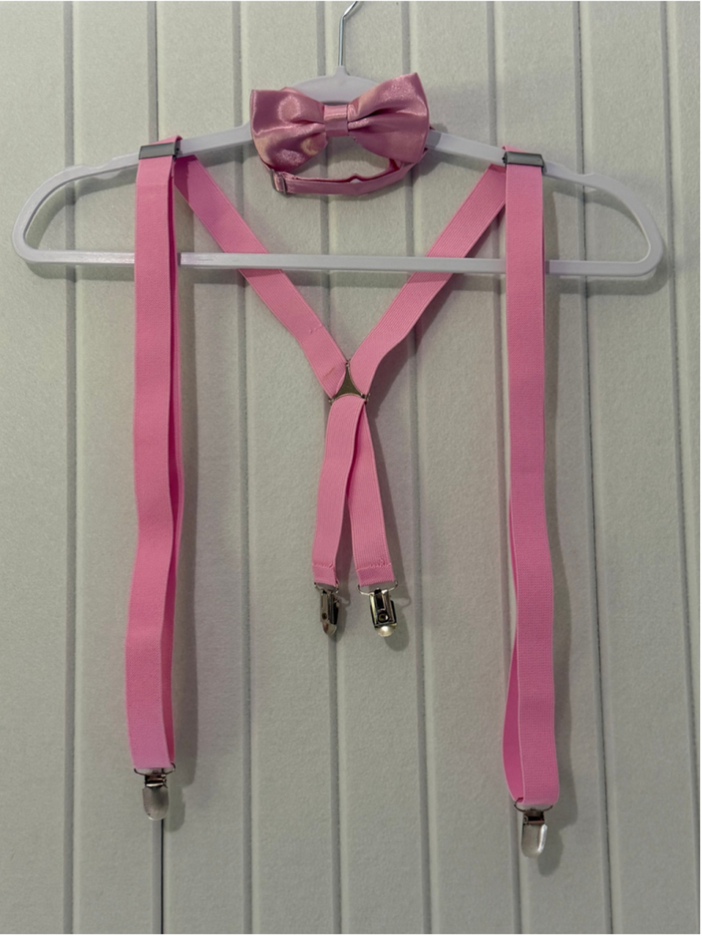 Pale pink bow tie and suspenders